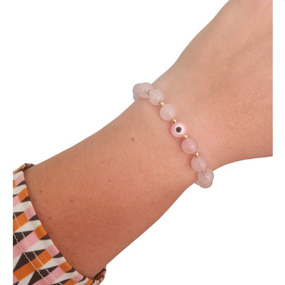 Pulsera curativa con dije de Ojo Turco y Cuarzo Rosa de Joyas Lucyana